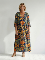 Elise | Czysta, ozdobna sukienka midi w kwiaty