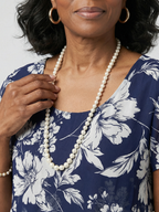 Thea | Subtelna Kwiatowa Sukienka do Kolan