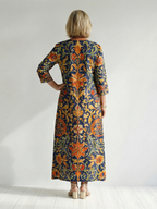 Elise | Czysta, ozdobna sukienka midi w kwiaty