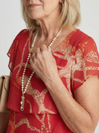 Nora | Miękka Abstrakcyjna Sukienka do Kolan