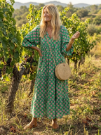 Fiora | Sukienka midi z dekoltem w serek i kwiatowym wzorem